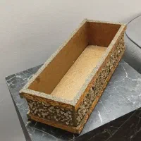 گلدان مستطیل سنگ کاری شده وگل مصنوعی  خط کش خیاطی