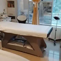 تخت فیشیال ماساژ مژه و کمد کشو دار