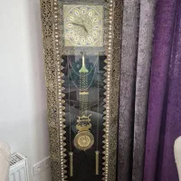 ساعت برنجی ایستاده ه