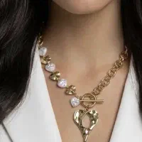 گردنبند طرح طلا ترکیب با مروارید دفرمه