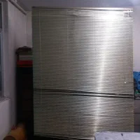 پرده کرکره ای فلزی سبز و قهوه ای