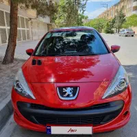 پژو 207 پاناروما 1401 قرمز فرمان برقی