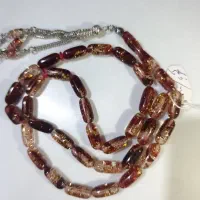 تسبیح کهربا قرمز زرکوب