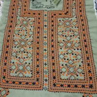 لباس  دست دوز  (اسم تپه شلوکی)