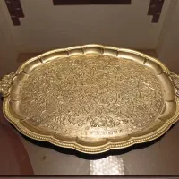 سینی فلزی با نقش برجسته