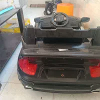 ماشین شارژی و دوچرخه