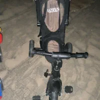 کالسکه سه چرخه لوتوس