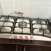 اجاق گاز رومیزی با کابینت فوق العاده سالم
