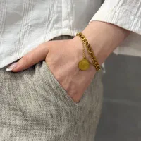 دستبند دو لاین کارتیر با سکه ورساچه