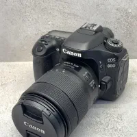 دوربین کنون 80D با لنز 18-135 در حد‌ نو با گارانتی