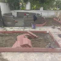 جدول زدن دورباغچه بنای سیمان کاری