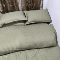 یک عدد لحاف و یک عدد تشک پشم گوسفند.