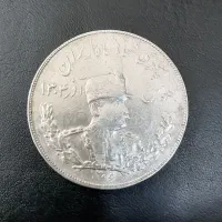 دو عدد سکه رضا شاه پهلوی و احمد شاه قاجار