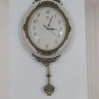 ساعت دیواری آونگ دار