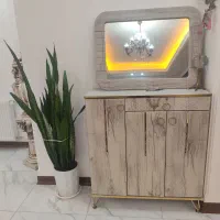 جاکفشی بااینه