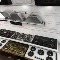 اجاق گاز رومیزی صفحه‌ ای سفید و مشکی ده سال ضمانت