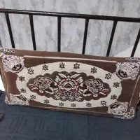 دو عدد پشتی و یک عدد قالیچه