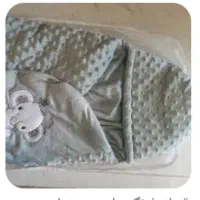 قنداق فرنگی مشابه همین ویک عدد پتو کلادار نوزادی