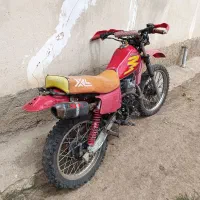 اکسل|موتورسیکلت|بره‌سر, |دیوار