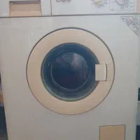 لباس شویی  آ گه