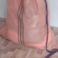 یک گونی لباس  کهنه