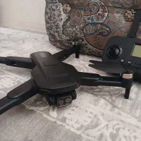 کوادکوپترSG105 با ۲ باتری، کیف و جعبه نو