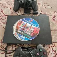 دستگاه ps2  دودسته همراه با ۲ تا بازی