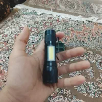 همراه با شارژر و جا قیمت 500 هزار تومان