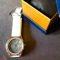 ساعت مچی قلمزنی دسته چرم