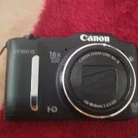 دوربین canon  همراه با شارژر و کیف