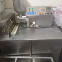دستگاه سیخ گیر
