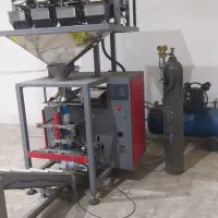 دستگاه بسته بندی چهارتوزین