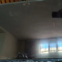 تلویزیون LED آکس 32 اینچ درحد نو با براکت