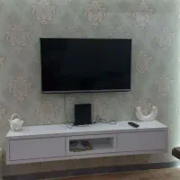 تلویزیون ال جی ۴۲ اینج و میز تلویزیون