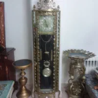 بوفه برنزی و ساعت برنزی سلطنتی ویترینی سالم و شیک