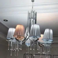 لوستر استیل ۸ شاخه و ساعت دیواری چوب لوتوس