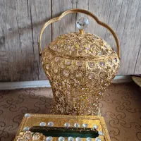 سطل و جادستمال و بوفه