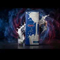 شیر پر چرب دومینو