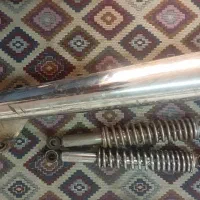 کمک فنر عقب و اگزوز موتور