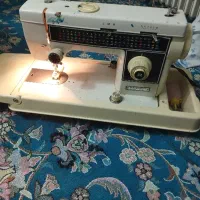 یک عدد چرخ خیاطی