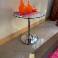 میز شیشه ای‌پایه استیل