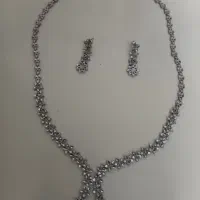 سرویس نقره تمام تراشه ..نگین نیست وزن ۲۱ گرمس