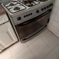 اجاق گاز فر دار کم کار