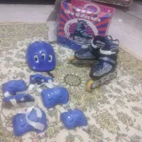 اسکیت با لوازم ایمنی و کارتون اسکیت