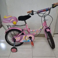 دوچرخه صورتی سایز۱۶ بهمراه کمکی