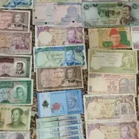 تعدادی سکه و اسکناس کلکسیونی