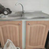 سینک ظرفشویی همراه با کابینت وشیر آب