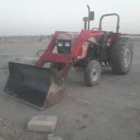 تراکتور بیل لودری با تریلی جهت کار.
