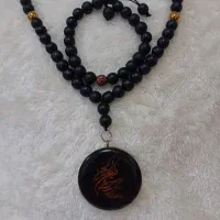 گردنبند و دستبند و ان یکاد
