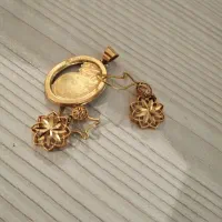 گوشواره و ون یکاد دو گرم چند سوت